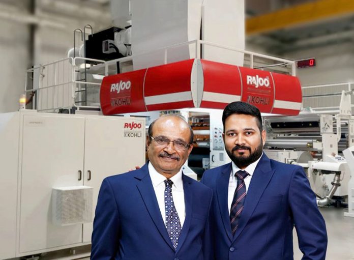 2Balaji-Furthers-its-extrusion-coating-and-LaminatingWeb750 Chandrakant Bhalara managing director of Balaji and Pranav Bhalara director of Balji in front of the new Rajoo-Kohli extrusion, coater, lamination line. Photo Rajoo