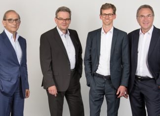 The new Isra Vision management team (from right: Hans Jürgen Christ, Tomas Lundin (speaker), Dr Johannes Giet) takes over from the retiring CEO and founder Enis Ersü (left)