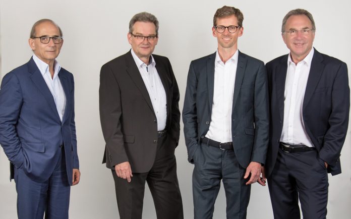 825_1Web750 The new Isra Vision management team (from right: Hans Jürgen Christ, Tomas Lundin (speaker), Dr Johannes Giet) takes over from the retiring CEO and founder Enis Ersü (left)