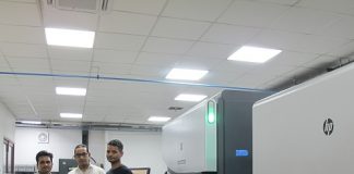 Mahesh Rajpoot, head of operations at Leap Digiprint, and his team standing with HP Indigo WS6800 digital press. Photo: PSA