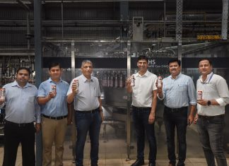 Prem Dewan, CMD of DeVANS, with his team