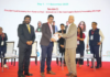 Vijay Sood presents a momento to Nitin Sanduja of Buhler India alongside the Intrapack exhibition at the first FoodTekPack Conference on 11 December 2025 at the Greater Noida Expo. Standing to their left is Ainan Shahidi. Behind them on the stage, from left to right, are Aditi Jhala, Bhushan Yengade, Himanshi Mahajan, and Sandeep Ghosh Photo PSA/IPAMA